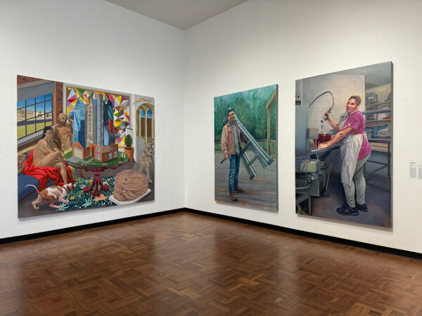 An installation photograph of large scale paintings by Francisco Moreno and Arely Morales.
