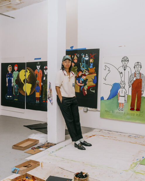 A photograph of artist Sable Elyse Smith in her studio.