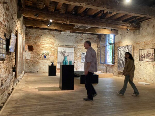 Installation view of a pavilion of work in the Venice Biennale in a historical building in Venice