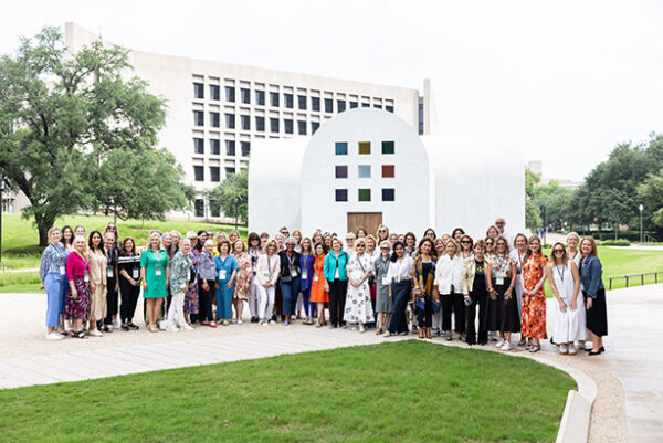A photograph of a group of women standing outside of Ellsworth Kelly's "Austin."
