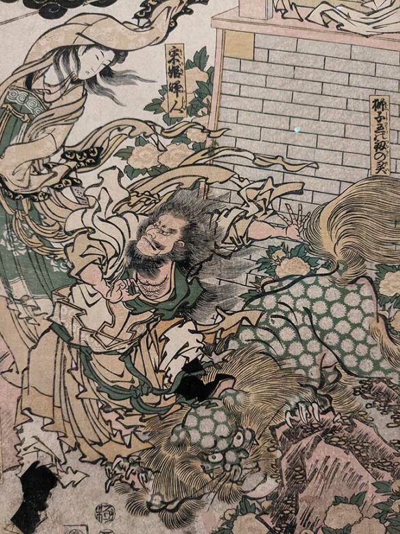 An Edo era woodblock print of a supernatural battle.