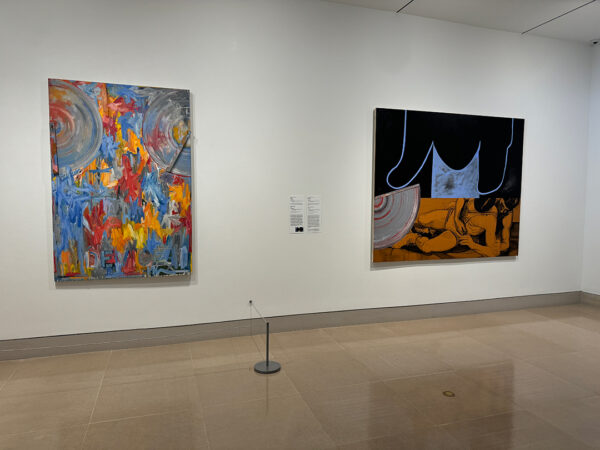 An installation image featuring works by Jasper Johns and Deborah Kass.
