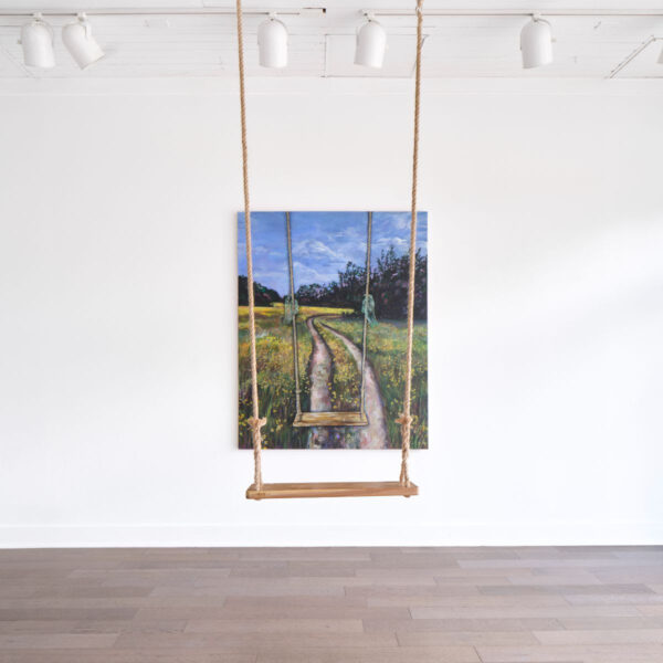 An installation image featuring a painting of a wooden swing by Moll Brau and an installed wooden swing in a gallery.