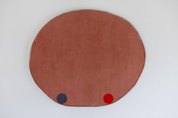 A circular, non-figurative abstract painting with a black and red dot on the bootom edge.