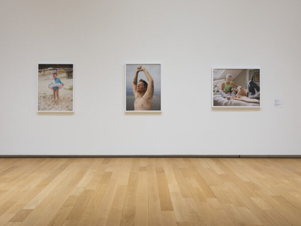 An installation image of three photographs by Jess T. Dugan.