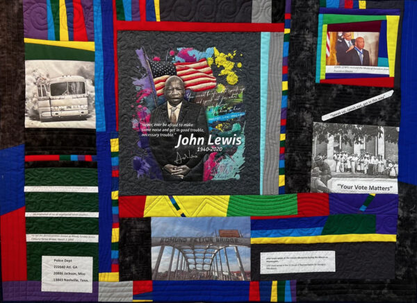 A photograph of a quilt honoring John Lewis.