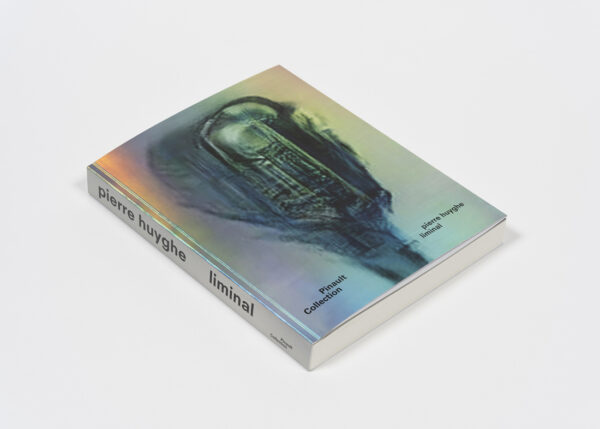 A holographic book cover that reads "Pinault Collection. "Pierre Huyghe: Liminal."