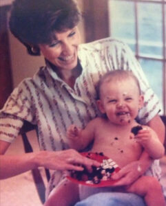 A photograph of artist Terri Thornton with her young daughter Alec.