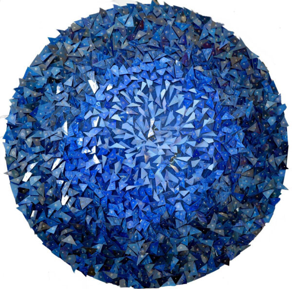 A mixed media collage work by Mabel Poble featuring a mass of blue triangles on a circular canvas.