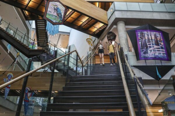 An interior view of the Austin Central Library. Several floors are connected by open air staircases.