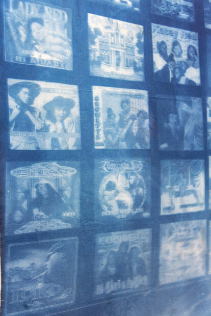 A cyanotype print of a grid of hip hop CD covers by women MCs.