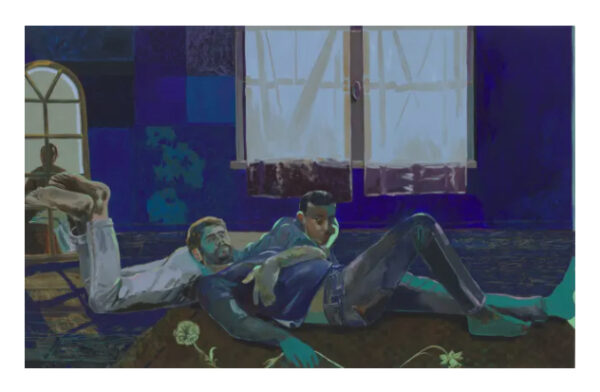 Two men lay on the floor of a blue room in front of a window.