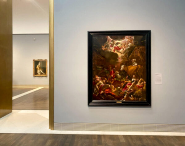 Two paintings hang on separate walls in separate rooms in a museum.