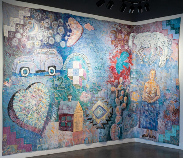 A large wall sized painting installed in the corner of a gallery.