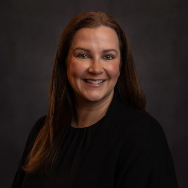 A headshot of arts administrator Jennifer Staton.