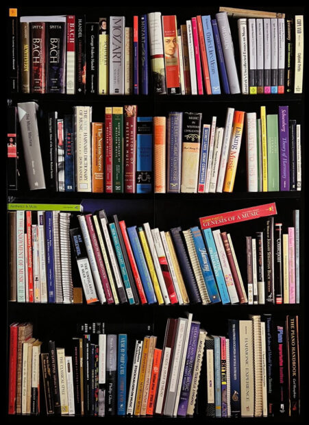 A photograph by Suzanne Bloom of a book shelf filled with books.