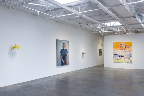 An installation image of works by various women artists.