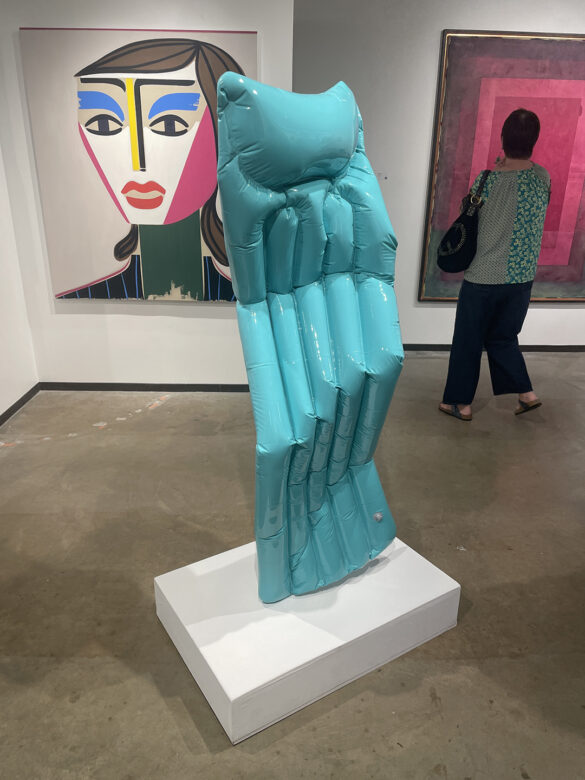 Adam-Parker-Smith_Contrapposto-Pool-Float A photograph of a resin sculpture shaped like a pool float.