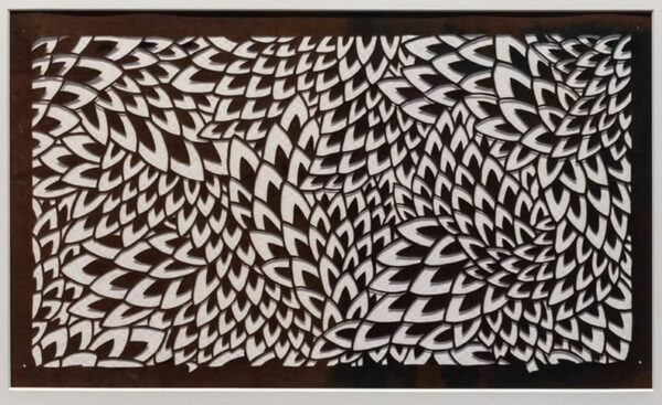 An intricately patterned stencil.