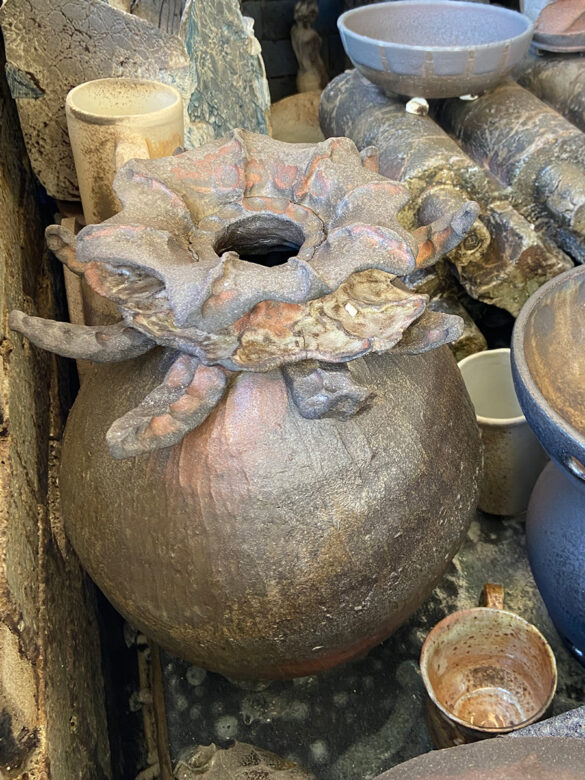 “Work-in-the-kiln-by-Meghan-Rutzebeck” A ceramic work, by Meghan Rutzebeck, sitting in a kiln.