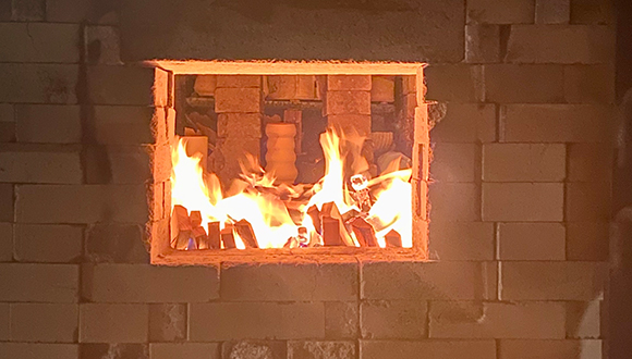 feature_A-Wood-Burning-Train-Kiln A photograph of a wood burning train kiln.